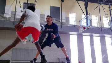 A MONDO personal basketball trainer and coach, training a high school age player, developing his skills