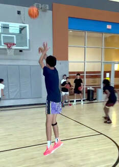 Boys participate in a basketball shooting clinic hosted by MONDO AthleticsPicture